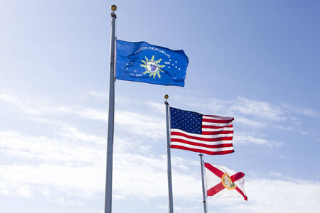 Flags of States, Florida and Key West with a sky in a background の写真素材
