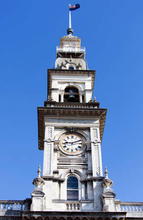 Dunedin Town Hall tower with a clock (New Zealand).
