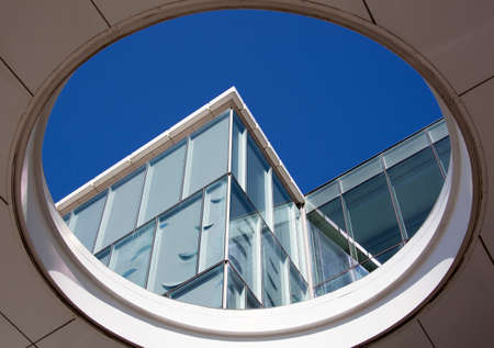 The view through the hole of a modern building in Wellington city (New Zealand).の写真素材