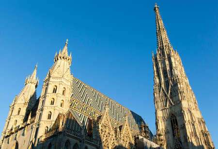 Spires of St. Stephen's Cathedral in a sunset light (Vienna, Austria).の写真素材