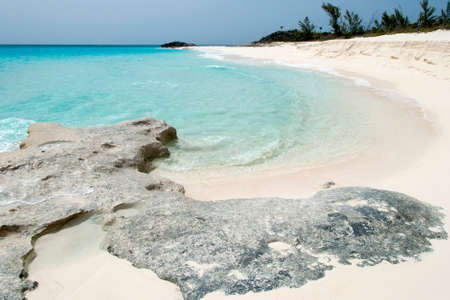 The view of a sandy shore on uninhabited Half Moon Cay island (Bahamas).の写真素材