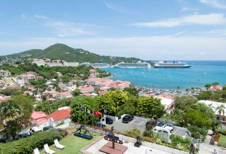 The view of Charlotte Amalie town and cruise liners docked in Long Bay (U.S. Virgin Islands).の写真素材