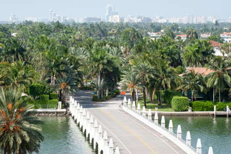 The entrance bridge to Palm Island, residential district in Miami (Florida).の写真素材