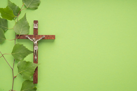 Christian PeChristian Pentecost. Whit Sunday. A cross with a birch branch on a white, green, red and black backgroundの写真素材