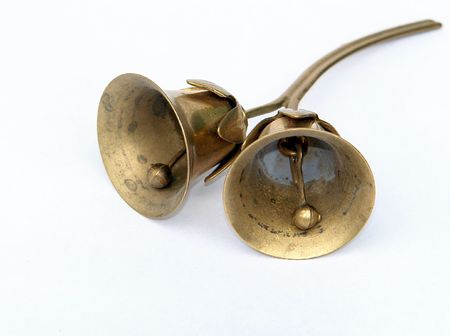 Bronze bells isolated on white backgroundの写真素材