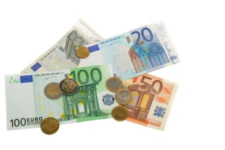Euro banknotes and coins isolated on white backgroundの写真素材