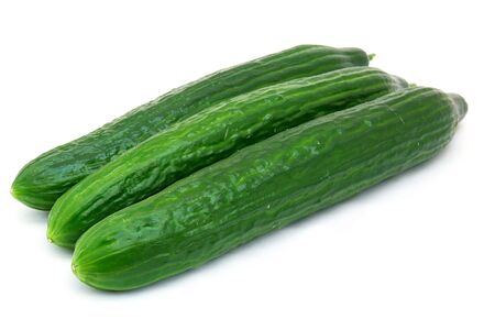   A fresh green cucumber isolated on a white background                                              の写真素材