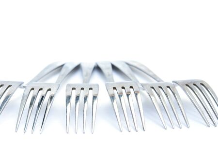 Group of Forks from the aged metal. Isolated on white                               