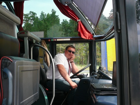 The young bus driver on the roads of Lithuania の写真素材