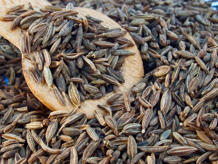  An image of Indian cumin seeds in a spoon