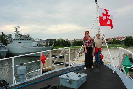 Tour on a military ship berthed on landing stageの写真素材