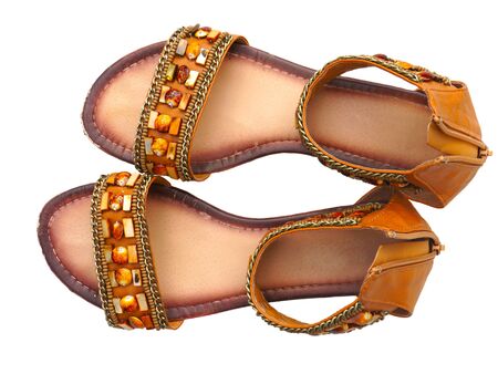 Women's sandals with ornaments isolated on a white backgroundの写真素材