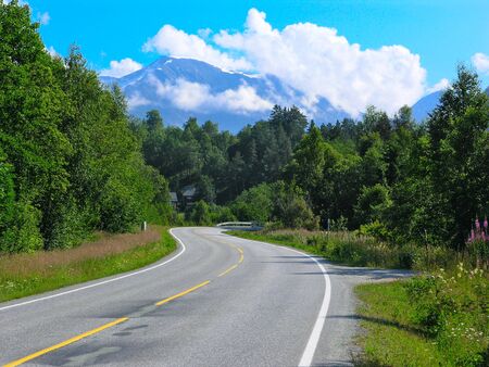 Scenic road and beautiful mountains in Norwayの写真素材