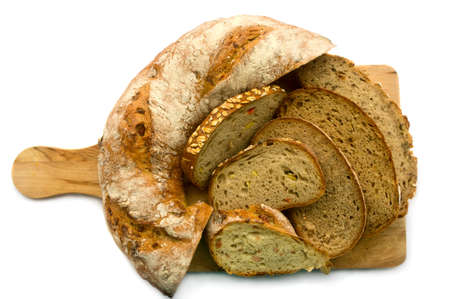 Assortment of baked bread on white backgroundの写真素材