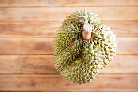 Durian on wooden table, Thailand.