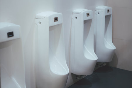 White urinals in the men toilet.の写真素材