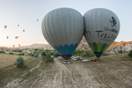 One of the most important events in Cappadocia, a town that remains in Turkey is the balloon trip where dozens almost every day rise up giving an impressive show at each sunrise (3)のeditorial素材