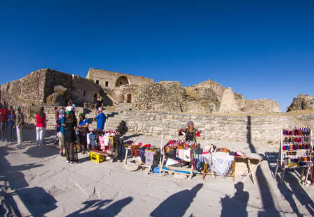 Sale of handicrafts at the exit of the catacombs in Cappadocia where some traditional dolls made partly with recycled materials stand out.のeditorial素材