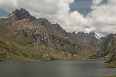 Lake Querococha in Peru, which is located at 3,980 meters above sea level, its vegetation is of moorland and its waters are the product of the melting of snowy peaks.の写真素材