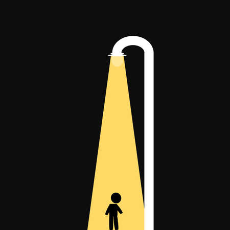 Child icon standing in a night street light.の写真素材