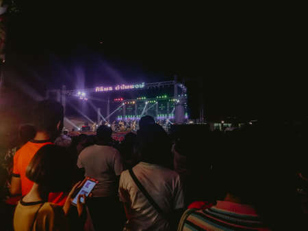 Bangkok, Thailand - SEP 16, 2019: Crowd at a concert, back light silhouetteの写真素材