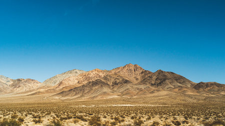 Arid Mountains landscape against clear blue sky in Nevada in high desertの写真素材