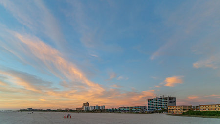 beachfront hotels line treasure island beach at sunsetのeditorial素材