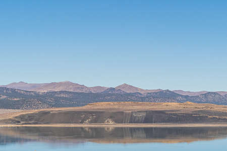 Mono lake, California in Autumn on sunny day with clear blue sky and tufaの写真素材