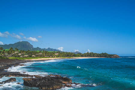 Shipwreck beach as viewed from Poipu point on island of Hawaiiの写真素材