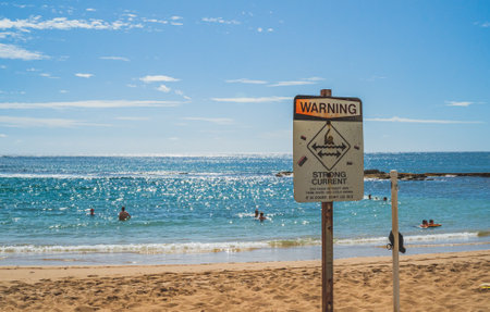Strong currents warning sign at tropical beach Hawaii rip tidesのeditorial素材