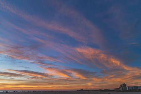 beachfront hotels line treasure island beach at sunsetのeditorial素材