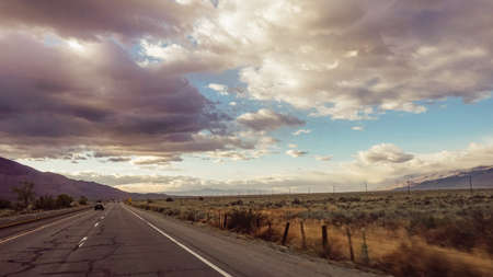 Dramatic view of road with cloudy and smokey sky from nearby fires