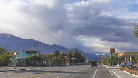 Historic Small mountain town in California with smoke from wild fire in skyのeditorial素材