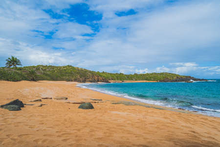 Panoramic view of tropical Red sand beach and blue water against skyの写真素材