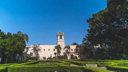 Beautiful Alcazar gardens at Balboa park San Diego against blue sky
