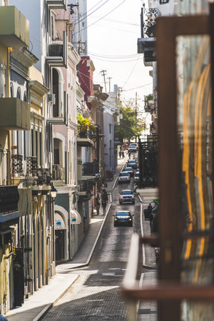 VIew of vibrant narrow street in Old San Juan Puerto Rico from balconyのeditorial素材
