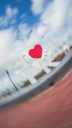 San Juan, Puerto Rico March 29, 2021: Abstract concept spinning motion view of I love Puerto Rico sign on sunny day verticalのeditorial素材