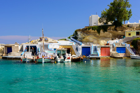 Scenic Mandrakia village traditional Greek village by the sea with sirmate - traditional fishermen's houses, Milos island, Cyclades, Greece.の写真素材