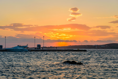 PAROS ISLAND, GREECE - MAY 29: a Beautiful sunset over the sea on May 29, 2015, Paros island, Cyclades, Greece.のeditorial素材