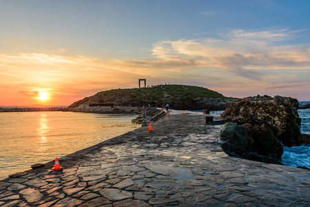 Naxos island, Greece - JUNE 2: the Ancient marble gate "Portara" - the entrance to the temple of Apollo in JUNE 2, 2015, Naxos island, Cyclades, Greece.のeditorial素材