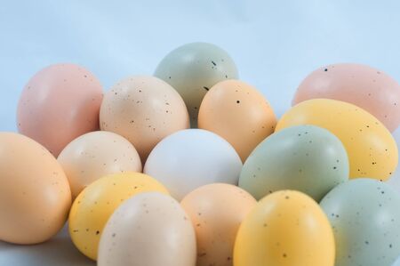 Easter eggs with regular egg in the centerの写真素材