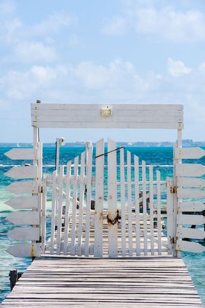 Dock with gate in Cancun Mexicoの写真素材