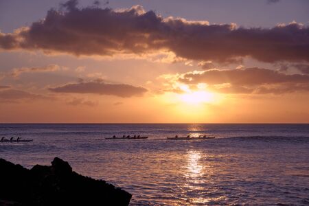 Sunsetting on the coast of Oahu, Hawaii in the city of Ko Olinaの写真素材