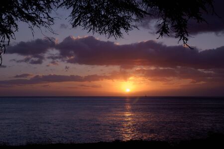 Sunsetting on the coast of Oahu, Hawaii in the city of Ko Olinaの写真素材