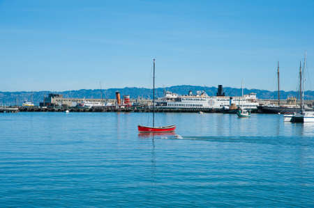San Francisco, CA - February 03: Swimmers swimming in Aquatic Park Cose in San Francisco's Maritime National Historical Park in San Francisco Bayのeditorial素材
