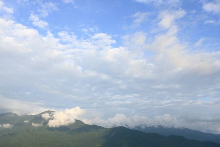 Mountain landscape with cloudy sky in Sikkim, Indiaの写真素材