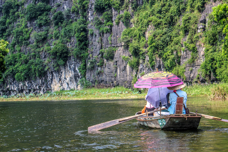 Riding a boat on the river in Ninh Binh, Vietnamのeditorial素材