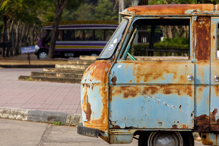 Rusted carcass of old abandoned Net Van.Thailandの写真素材