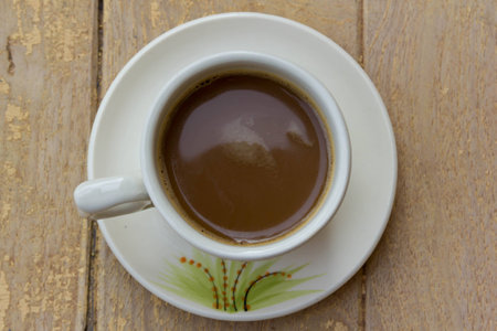Coffee cup on wooden table cup of coffeeの写真素材