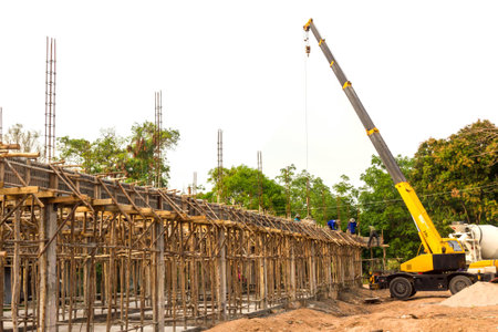 Construction cranes and construction of new apartmentsの写真素材